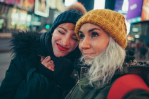 Two girlfriends on times square new york Two girlfriends on times square new york
